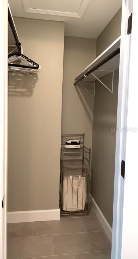 7152 Sandy Ln, Wesley Chapel, FL 33544 - spacious closet featuring tile patterned flooring