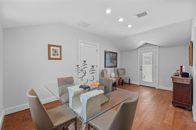 475 28th Ave N, Saint Petersburg, FL 33704 - dining room featuring lofted ceiling, baseboards, recessed lighting, and wood finished floors