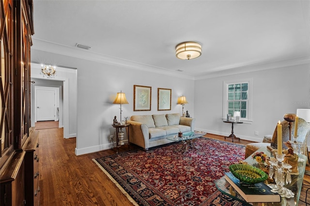 475 28th Ave N, Saint Petersburg, FL 33704 - living room with ornamental molding, baseboards, and wood finished floors