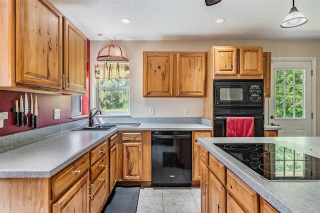 1611 County Road 753s, Webster, FL 33597 - kitchen featuring black appliances, a sink, light tile patterned floors, light countertops, and recessed lighting