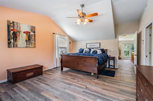 1611 County Road 753s, Webster, FL 33597 - bedroom featuring wood finished floors, vaulted ceiling, a ceiling fan, and baseboards