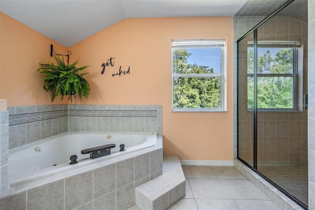1611 County Road 753s, Webster, FL 33597 - bathroom featuring a shower stall, a tub with jets, plenty of natural light, tile patterned floors, and lofted ceiling