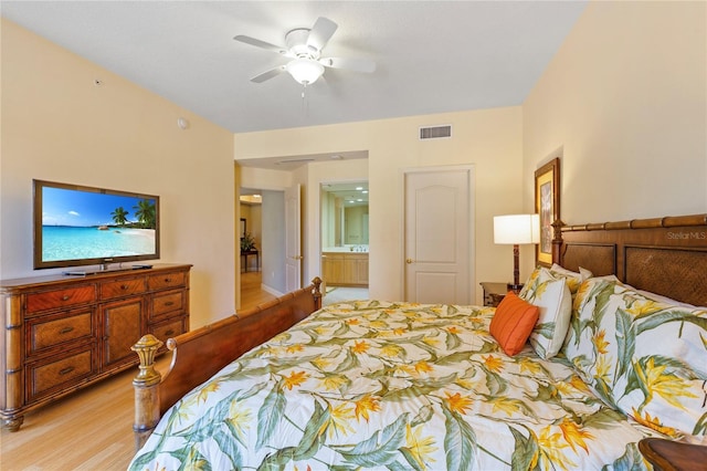 521 Mandalay Ave Unit 307, Clearwater Beach, FL 33767 - bedroom with light wood-style floors and ceiling fan