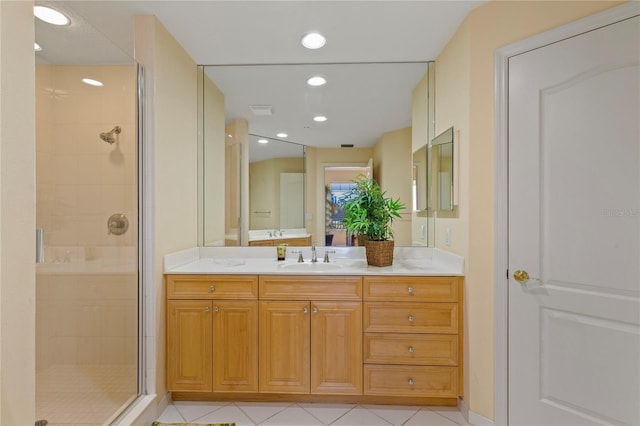 521 Mandalay Ave Unit 307, Clearwater Beach, FL 33767 - bathroom featuring a shower stall, tile patterned floors, vanity, and recessed lighting