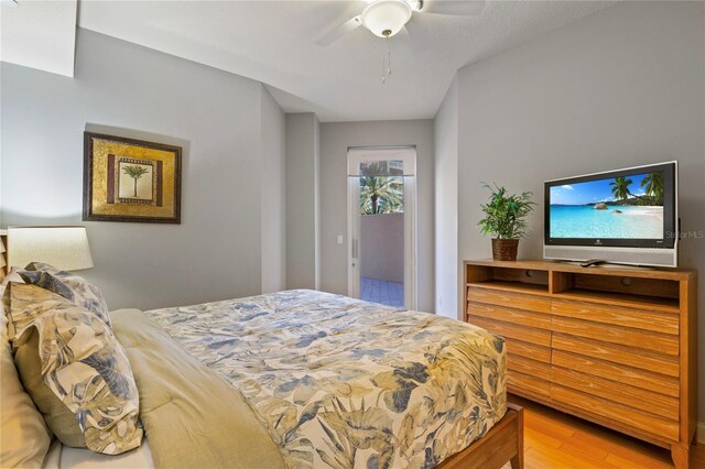 521 Mandalay Ave Unit 307, Clearwater Beach, FL 33767 - bedroom with light wood-style floors and a ceiling fan