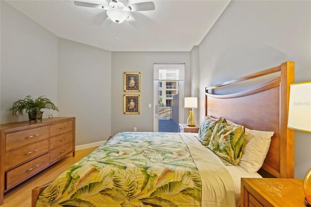 521 Mandalay Ave Unit 307, Clearwater Beach, FL 33767 - bedroom featuring light wood-type flooring, ceiling fan, and baseboards