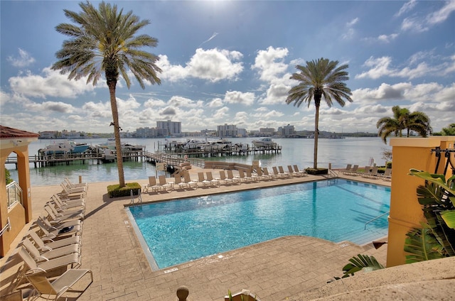 521 Mandalay Ave Unit 307, Clearwater Beach, FL 33767 - community pool featuring a water view and a patio area