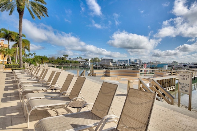 521 Mandalay Ave Unit 307, Clearwater Beach, FL 33767 - view of patio / terrace featuring a water view