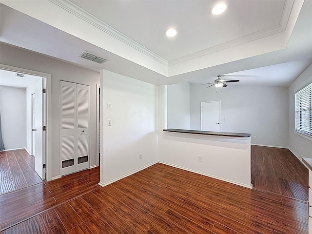 507 E Curlew Pl, Tarpon Springs, FL 34689 - spare room with ornamental molding, wood finished floors, a raised ceiling, ceiling fan, and recessed lighting