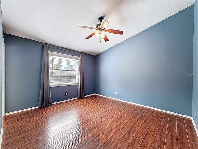507 E Curlew Pl, Tarpon Springs, FL 34689 - unfurnished room featuring wood finished floors, ceiling fan, and baseboards