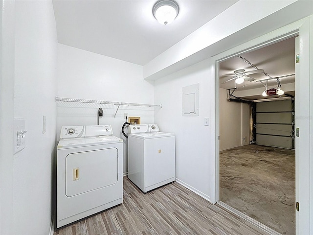 507 E Curlew Pl, Tarpon Springs, FL 34689 - washroom featuring washer and dryer, electric panel, and baseboards