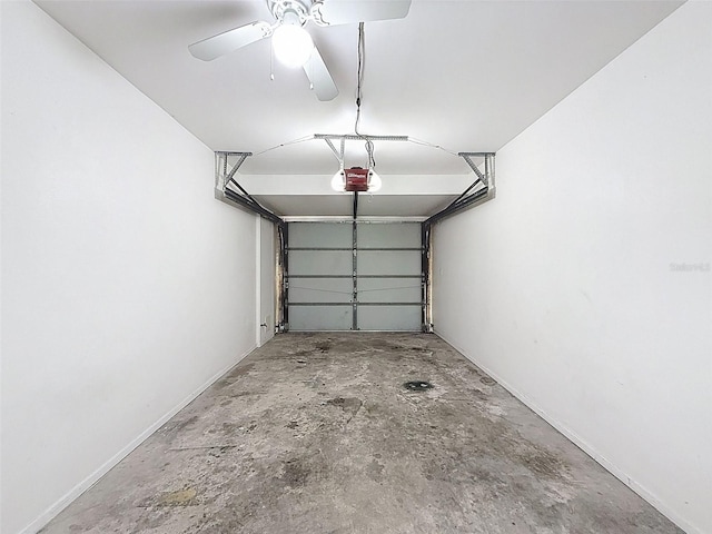 507 E Curlew Pl, Tarpon Springs, FL 34689 - garage featuring a garage door opener and a ceiling fan