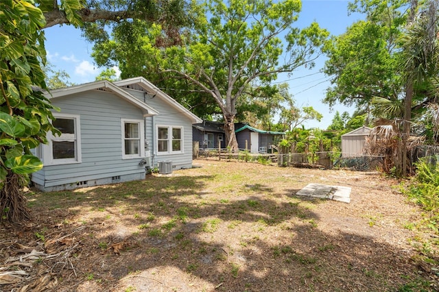 6489 30th St N, Saint Petersburg, FL 33702 - fenced backyard featuring central AC unit