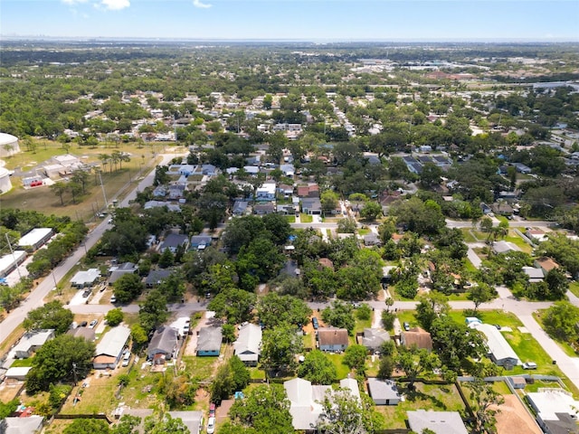 6489 30th St N, Saint Petersburg, FL 33702 - aerial view of property and surrounding area with nearby suburban area