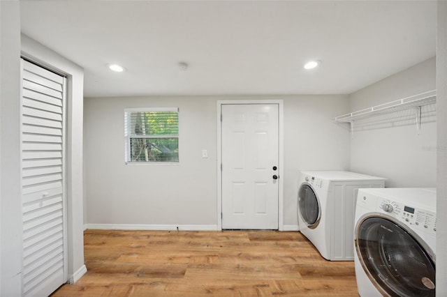 909 E 28th Ave, Tampa, FL 33605 - laundry area featuring washing machine and clothes dryer, baseboards, light wood-type flooring, and recessed lighting