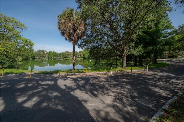 5530 N 9th St Unit 6, Tampa, FL 33604 - view of asphalt road with a water view and curbs