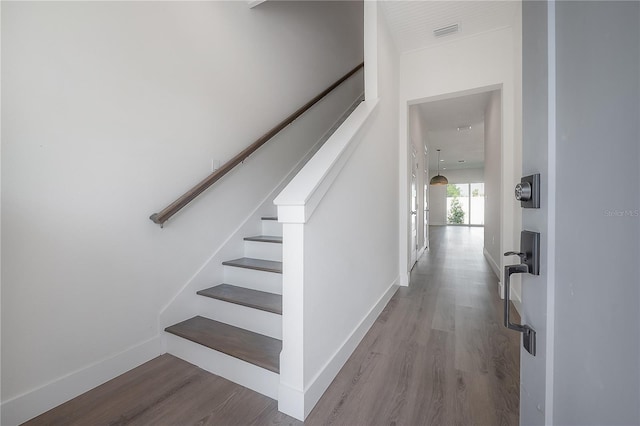 5530 N 9th St Unit 6, Tampa, FL 33604 - stairway featuring wood finished floors and baseboards