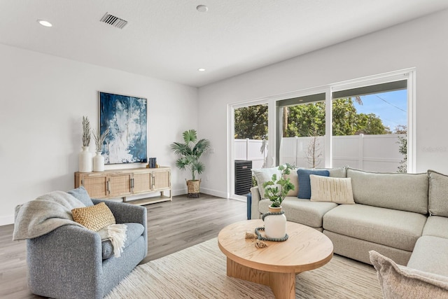 5530 N 9th St Unit 6, Tampa, FL 33604 - living area featuring wood finished floors, baseboards, and recessed lighting