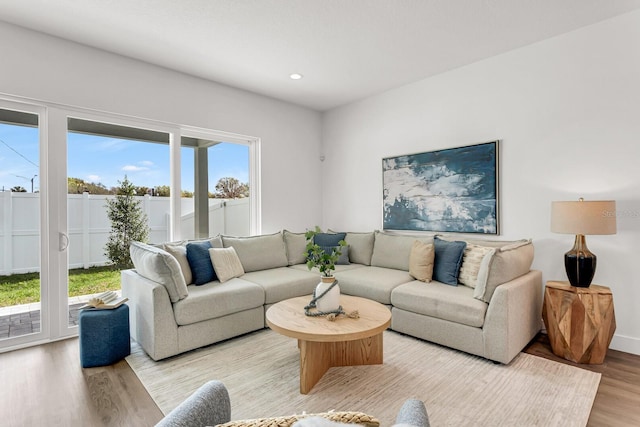 5530 N 9th St Unit 6, Tampa, FL 33604 - living room with light wood-style flooring and recessed lighting