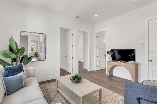 5530 N 9th St Unit 6, Tampa, FL 33604 - living area featuring wood finished floors, recessed lighting, and baseboards