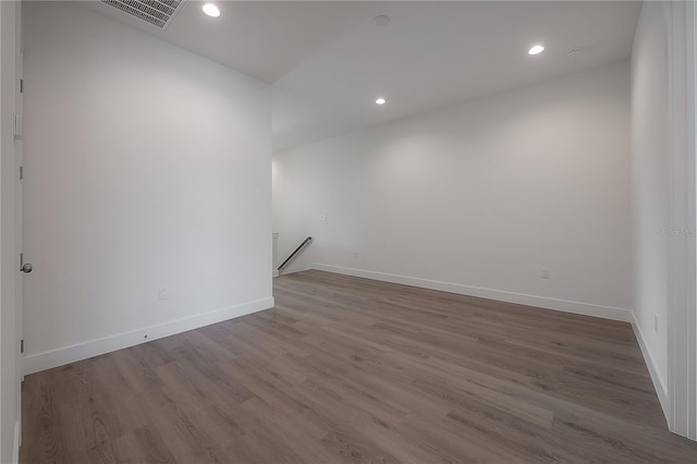 5530 N 9th St Unit 6, Tampa, FL 33604 - unfurnished room with baseboards, wood finished floors, and recessed lighting