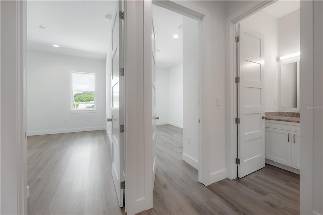 5530 N 9th St Unit 6, Tampa, FL 33604 - hall with light wood-style flooring, baseboards, and recessed lighting