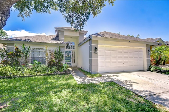 1603 Scotch Pine Dr, Brandon, FL 33511 - view of front of property featuring stucco siding, an attached garage, concrete driveway, and a front lawn