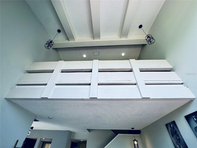 4360 Outrigger Ln, Tampa, FL 33615 - detailed view of beam ceiling and a textured ceiling