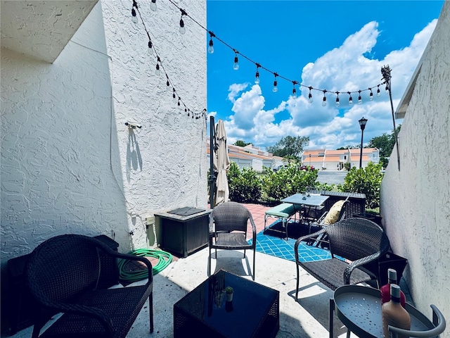 4360 Outrigger Ln, Tampa, FL 33615 - view of patio featuring an outdoor hangout area