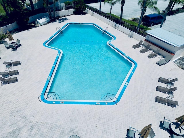 4360 Outrigger Ln, Tampa, FL 33615 - community pool featuring a patio