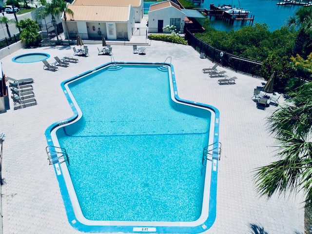 4360 Outrigger Ln, Tampa, FL 33615 - community pool with a patio area and a water view