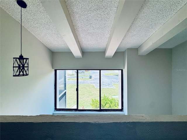 4360 Outrigger Ln, Tampa, FL 33615 - detailed view of beam ceiling and a textured ceiling