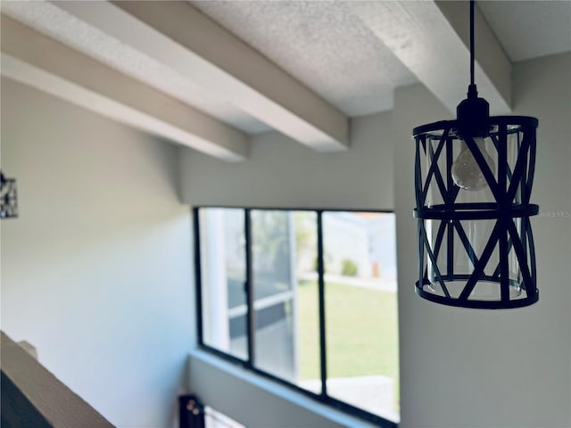 4360 Outrigger Ln, Tampa, FL 33615 - detailed view of beam ceiling and a textured ceiling