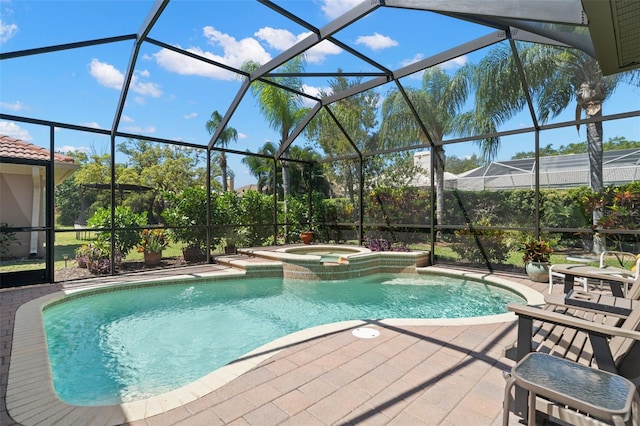 8708 Laurel Dr N, Pinellas Park, FL 33782 - view of swimming pool featuring a patio, a pool with connected hot tub, and glass enclosure