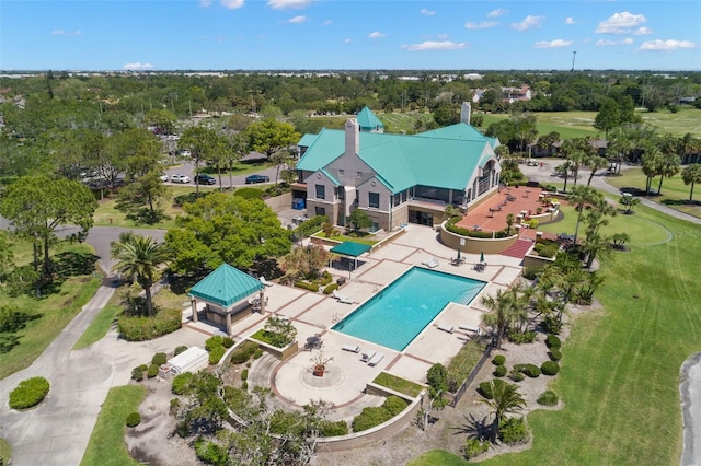 8708 Laurel Dr N, Pinellas Park, FL 33782 - drone / aerial view of a pool area and a tree filled landscape
