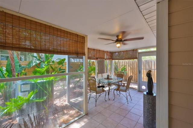 3053 S Concordia Ave Unit A, Tampa, FL 33629 - sunroom featuring a ceiling fan, tile patterned floors, and outdoor dining space