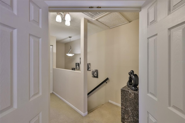 3053 S Concordia Ave Unit A, Tampa, FL 33629 - hallway featuring an upstairs landing, light colored carpet, and baseboards
