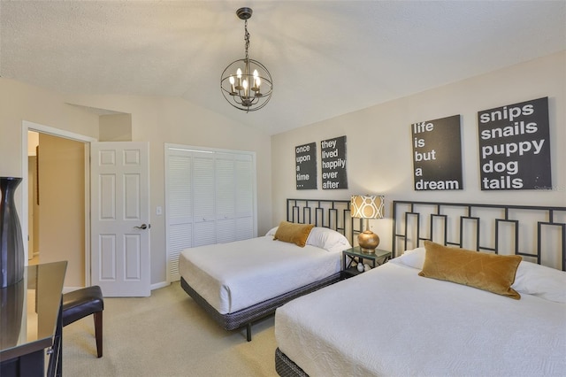 3053 S Concordia Ave Unit A, Tampa, FL 33629 - carpeted bedroom with a chandelier, vaulted ceiling, a closet, and baseboards