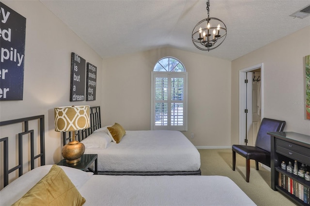 3053 S Concordia Ave Unit A, Tampa, FL 33629 - carpeted bedroom with lofted ceiling, a chandelier, and baseboards