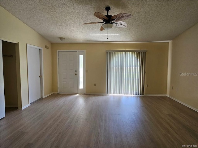 870 S Thyme Pt, Homosassa, FL 34448 - foyer with ceiling fan, wood finished floors, a textured ceiling, and baseboards