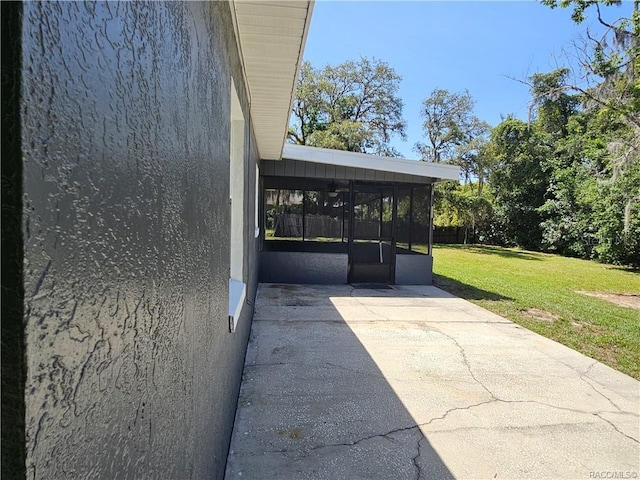 870 S Thyme Pt, Homosassa, FL 34448 - view of patio / terrace featuring a sunroom and a carport