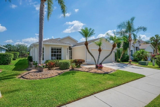 8223 Haven Harbour Way, Bradenton, FL 34212 - ranch-style house featuring concrete driveway, a garage, stucco siding, and a front yard