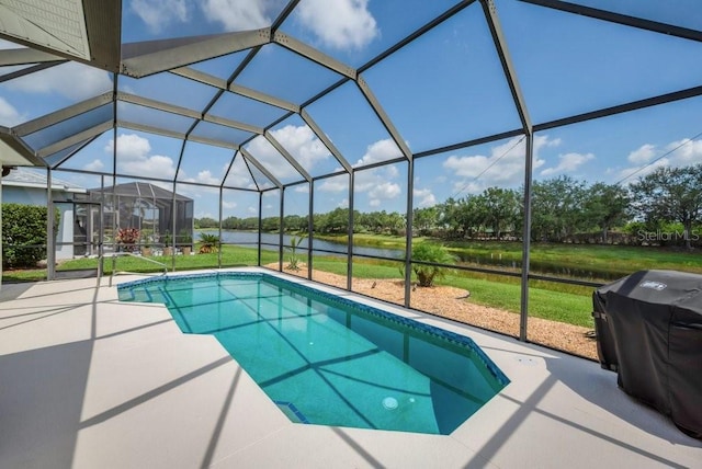 8223 Haven Harbour Way, Bradenton, FL 34212 - swimming pool with area for grilling, a patio area, a water view, and glass enclosure