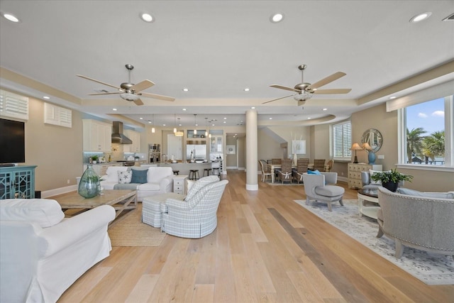 2 Gulf Blvd, Indian Rocks Beach, FL 33785 - living room featuring a ceiling fan, light wood-style floors, baseboards, and recessed lighting