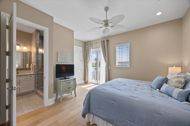2 Gulf Blvd, Indian Rocks Beach, FL 33785 - bedroom featuring access to exterior, light wood finished floors, connected bathroom, baseboards, and recessed lighting