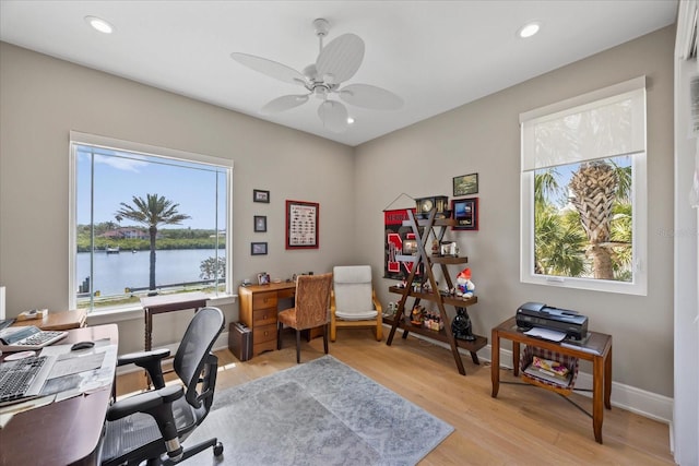 2 Gulf Blvd, Indian Rocks Beach, FL 33785 - office with ceiling fan, light wood finished floors, recessed lighting, a water view, and baseboards