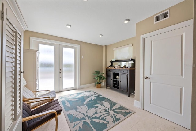 2 Gulf Blvd, Indian Rocks Beach, FL 33785 - living area featuring french doors and baseboards