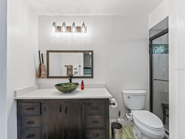 718 Crk 467, Lake Panasoffkee, FL 33538 - full bathroom featuring toilet, vanity, a stall shower, and baseboards