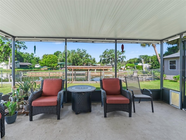 718 Crk 467, Lake Panasoffkee, FL 33538 - sunroom featuring an outdoor fire pit and plenty of natural light