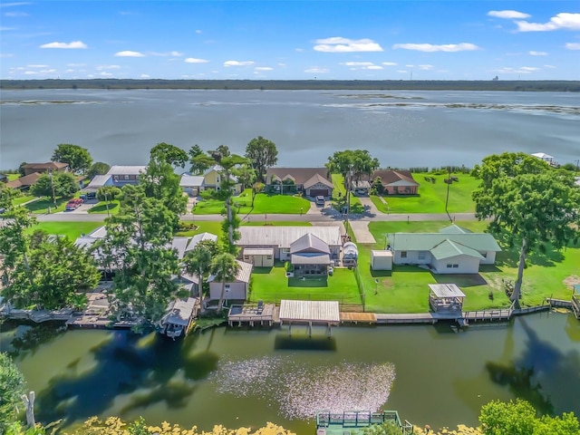 718 Crk 467, Lake Panasoffkee, FL 33538 - aerial view of residential area featuring a nearby body of water